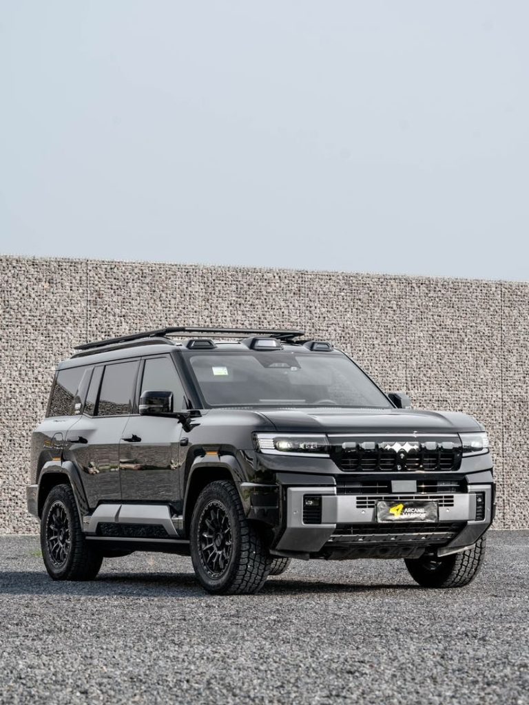 Black Leopard 8 with roof rack, front three-quarter view