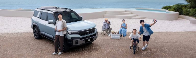 Family with the Leopard 8 at the beach