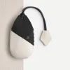 Ivory White Hand Strap key cover showing the complete cord, leather tag and stitching
